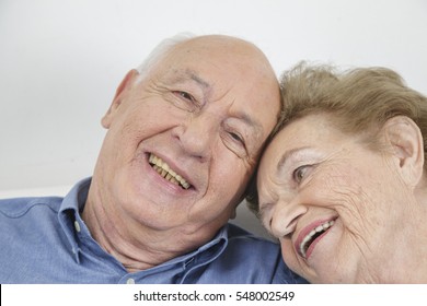 Happy Older Couple Still In Love And Playing And Being Silly