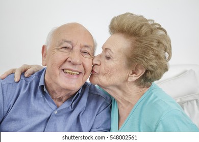 Happy Older Couple Still In Love And Playing And Being Silly