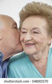 Happy Older Couple Still In Love And Playing And Being Silly