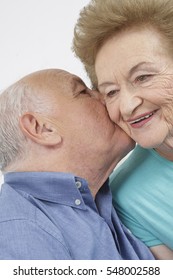 Happy Older Couple Still In Love And Playing And Being Silly