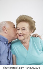 Happy Older Couple Still In Love And Playing And Being Silly