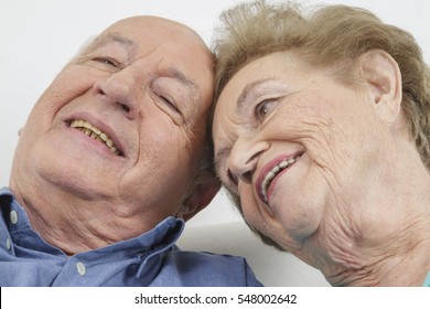 Happy Older Couple Still In Love And Playing And Being Silly