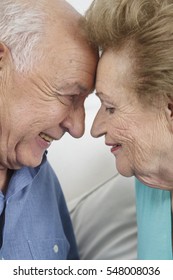 Happy Older Couple Still In Love And Playing And Being Silly 