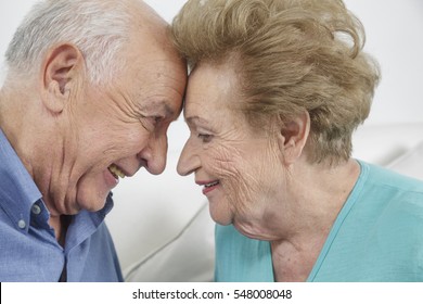 Happy Older Couple Still In Love And Playing And Being Silly 