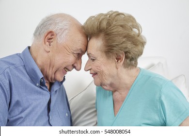 Happy Older Couple Still In Love And Playing And Being Silly 