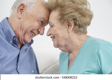 Happy Older Couple Still In Love And Playing And Being Silly 