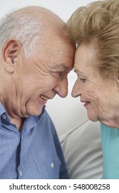 Happy Older Couple Still In Love And Playing And Being Silly 