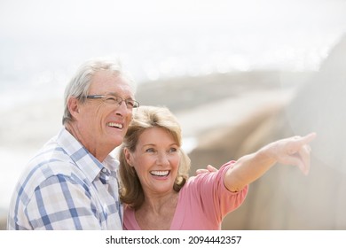 Happy Older Couple Walking Outdoors