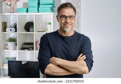 Happy Older Good Looking Casual Man At Home, Smiling. Portrait Of Mid Adult, Mature Age Man In Glasses,