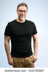 Happy Older Good Looking Casual Man At Home, Smiling. Portrait Of Mid Adult, Mature Age Man In Glasses, Isolated On White.