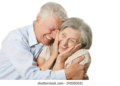 Happy Older Pair On A White Background