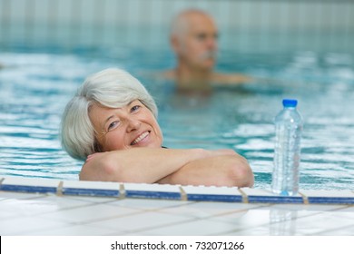 Happy Older Woman In A Swimming Pool