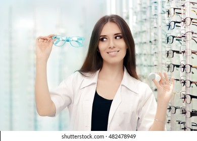 Happy Optician Choosing Between Glasses And Contact Lenses - Female Optometrist Proposing Eyeglasses And Contacts As Options
