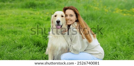 Similar – Pretty blond woman with her two dogs