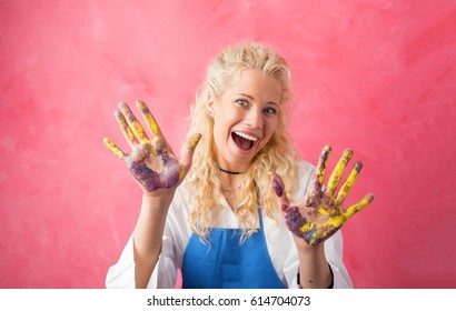 Happy Painter With Paint On Her Hands 