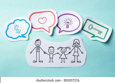 Happy paper family with speech bubbles of Success concept on the blue background.