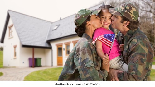 Happy parents in soldiers uniform kissing their daughter in garden - Powered by Shutterstock