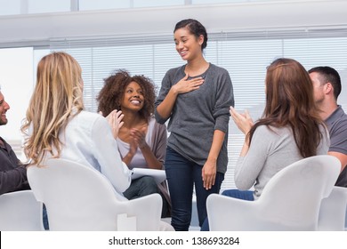 Happy Patient Has A Breakthrough In Group Therapy While Others Are Clapping Her