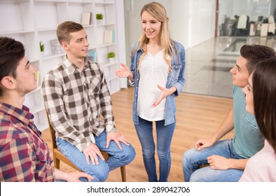 Happy Patient Has A Breakthrough In Group Therapy While Others Are Clapping Her.