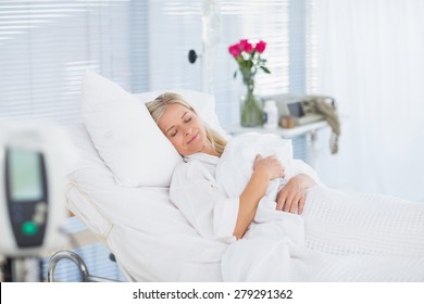 Happy Patient Lying On Her Bed In Hospital