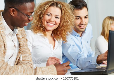 Happy People Doing Further Training In Academy Course With Laptop Computer