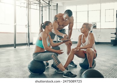 Happy people, fitness and online class with tablet or friends for workout or exercise on floor at gym. Young, active group and smile for virtual tutorial, warm up or training session on technology - Powered by Shutterstock