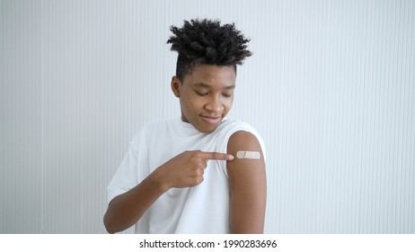 Happy People Got Vaccinated. Black People Africans Get Vaccine From Clinic. Portrait Of People Get Vaccine Injection Feeling Happy And Smile Happily With Vaccine.