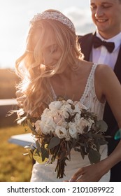 Happy People, Wedding Day, Young Couple In Love, Hug, Laughing. Sunset On Roof. Stunning Blonde Hair Bride And Handsome Groom