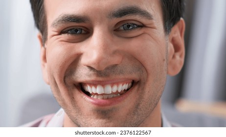 Happy perfect white teeth smile close up. American dental service clinic. Nice 30s person laugh. One fun young adult man. Joyful male guy face closeup. Oral tooth whitening stomatology. Dentistry care - Powered by Shutterstock