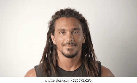 Happy person with dreadlocks look camera. Male hair style close up. Cute brutal smiling man face portrait. One joy 30s guy head shot. Nice dread hairstyle. Young adult hipster have fun. Good mood life - Powered by Shutterstock