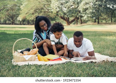 Happy Picnic Relax Black People Family With Son In Garden