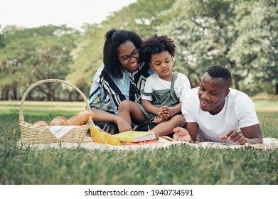 Happy Picnic Relax Black People Family With Son In Garden