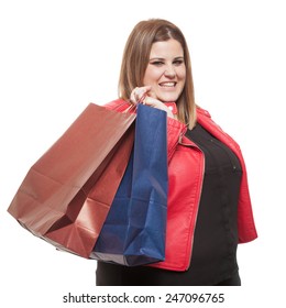 Happy Plus Size Woman Holding Shopping Bags On White Background.