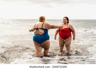 Happy Plus Size Women Having Fun On The Beach During Summer Vacation - Curvy Confident People Lifestyle Concept