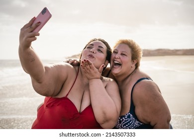 Happy Plus Size Women Taking Selfie With Mobile Smartphone On The Beach - Overweight Friends Having Fun During Vacation Time