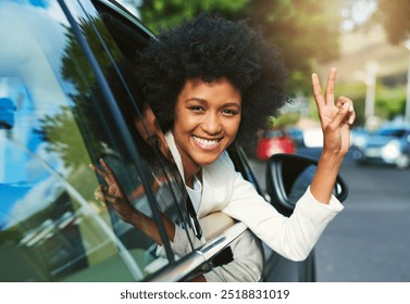 Happy, portrait and woman in car with peace sign and joy from morning commute to work. Urban, African professional and city travel with smile with freedom and emoji gesture with transport and drive - Powered by Shutterstock