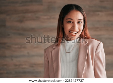 Happy, portrait and woman with her tongue out by a wall with a positive, goofy and confident mindset. Happiness, excited and headshot of a young female model fro Mexico with a silly face expression.