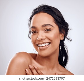 Happy, portrait and woman in studio for beauty, cosmetics and dermatology with confidence. Collagen, face and gen z by white background for treatment, smile and makeup for luxury and skincare - Powered by Shutterstock