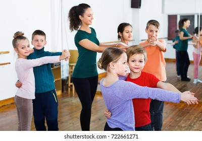 Happy Positive Children Studying Of Partner Dance  At Dance School