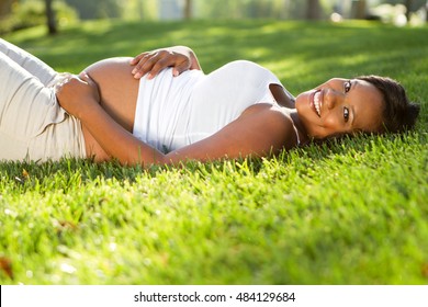 Happy Pregnant African American Woman.