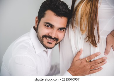 Happy Pregnant Couple From Asian, India. Living Young Couple