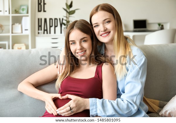 Happy Pregnant Lesbian Couple Home Stock Photo Edit Now
