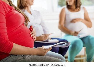 Happy Pregnant Women Meeting At Antenatal Class In The Hospital