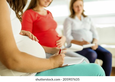 Happy Pregnant Women Meeting At Antenatal Class In The Hospital