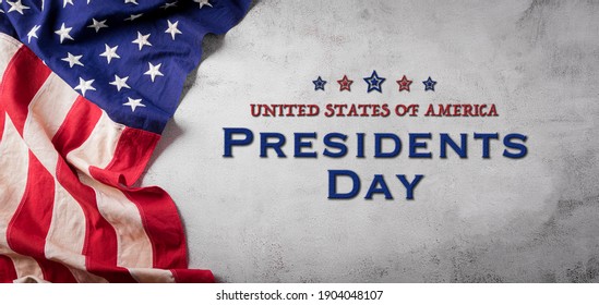 Happy presidents day concept with flag of the United States on old stone background. - Shutterstock ID 1904048107