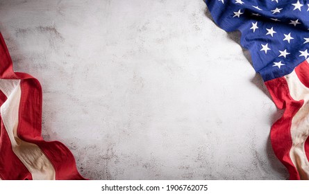 Happy presidents day concept with flag of the United States on old stone background. - Shutterstock ID 1906762075