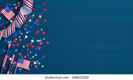 Happy Presidents Day concept. Grosgrain ribbon, American flags and confetti stars on blue background with copy space. Web banner template for USA Independence day or Memorial Day.