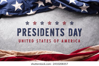 Happy Presidents day concept made from American flag and the text on dark stone background.