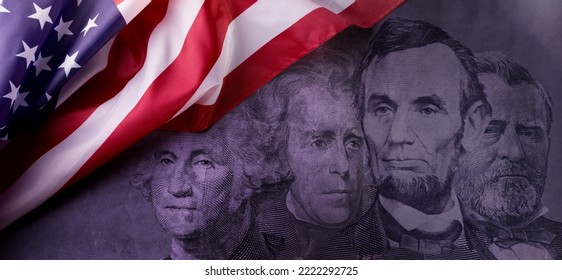 Happy Presidents Day Concept with the US national Flag against a collage of four American Presidents portraits cut of Dollar bills. - Shutterstock ID 2222292725