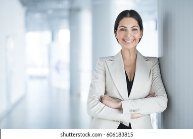 Happy Pretty Business Woman Standing In Hall